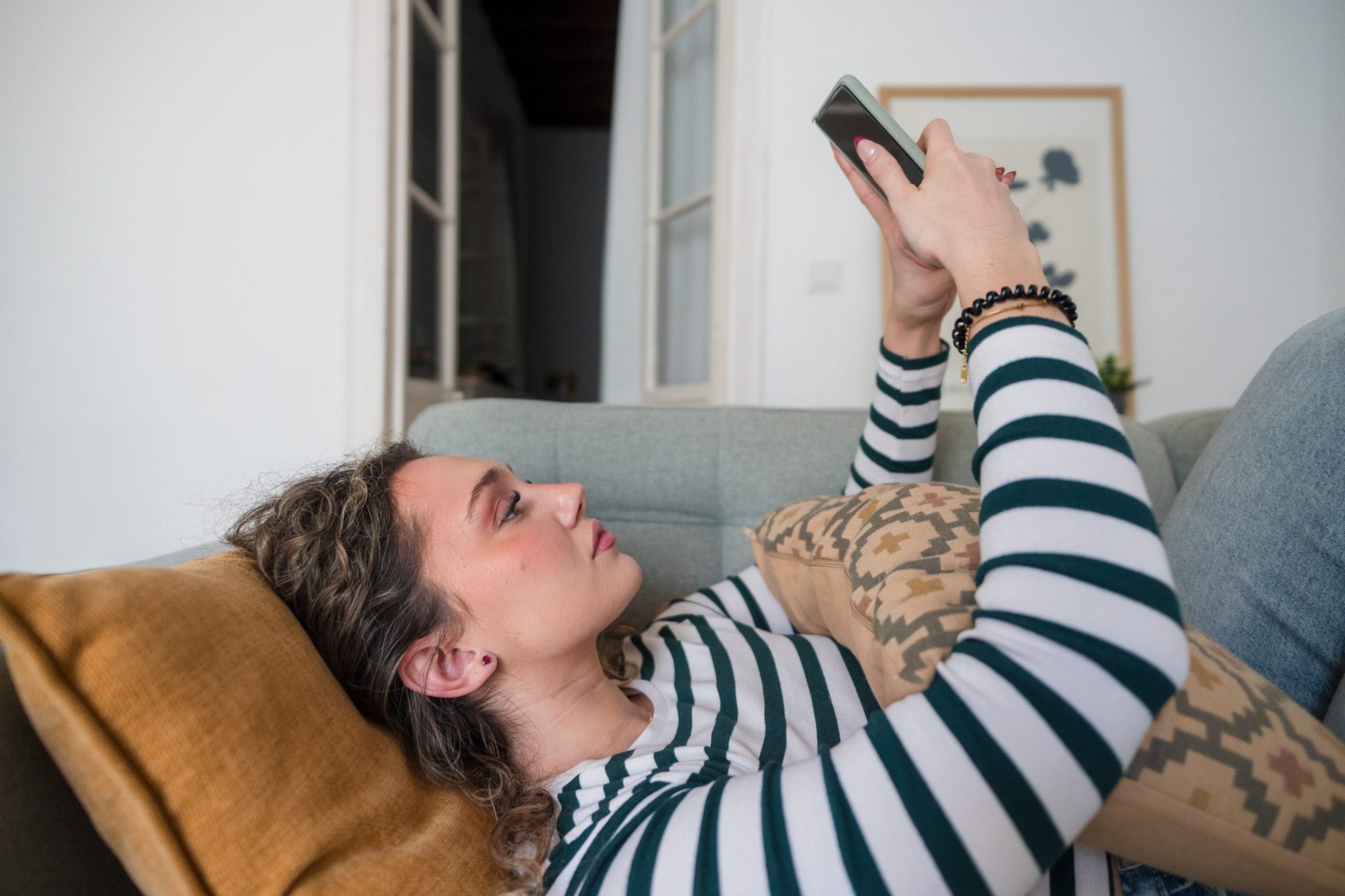 Gen Z hiring manager says CEOs are right about her generation’s ‘attitude’ problem after a candidate took the interview from her phone