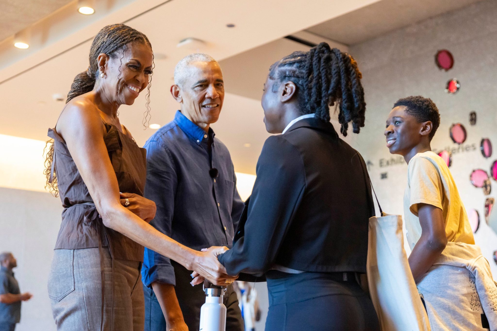 The first 100 visitors to the Obama Presidential center got a surprise: Barack and Michelle